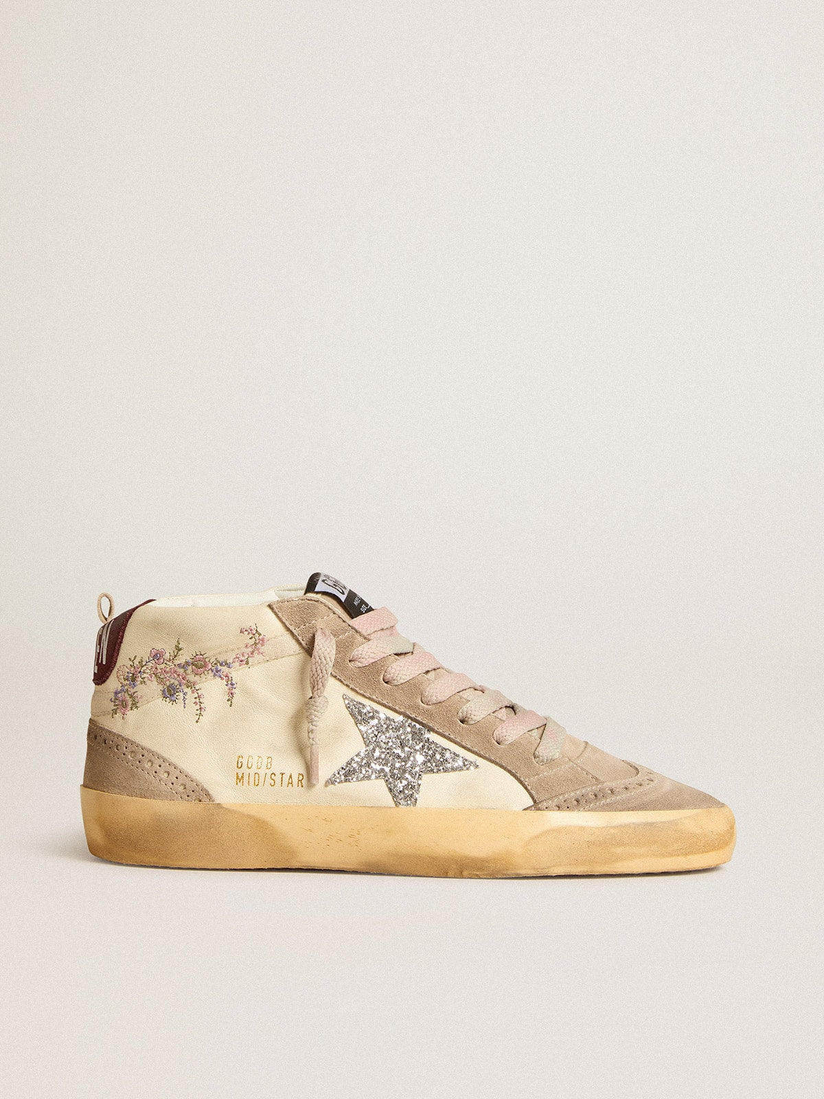 Mid Star para mujer en piel napa con bordado floral y estrella plateada con purpurina