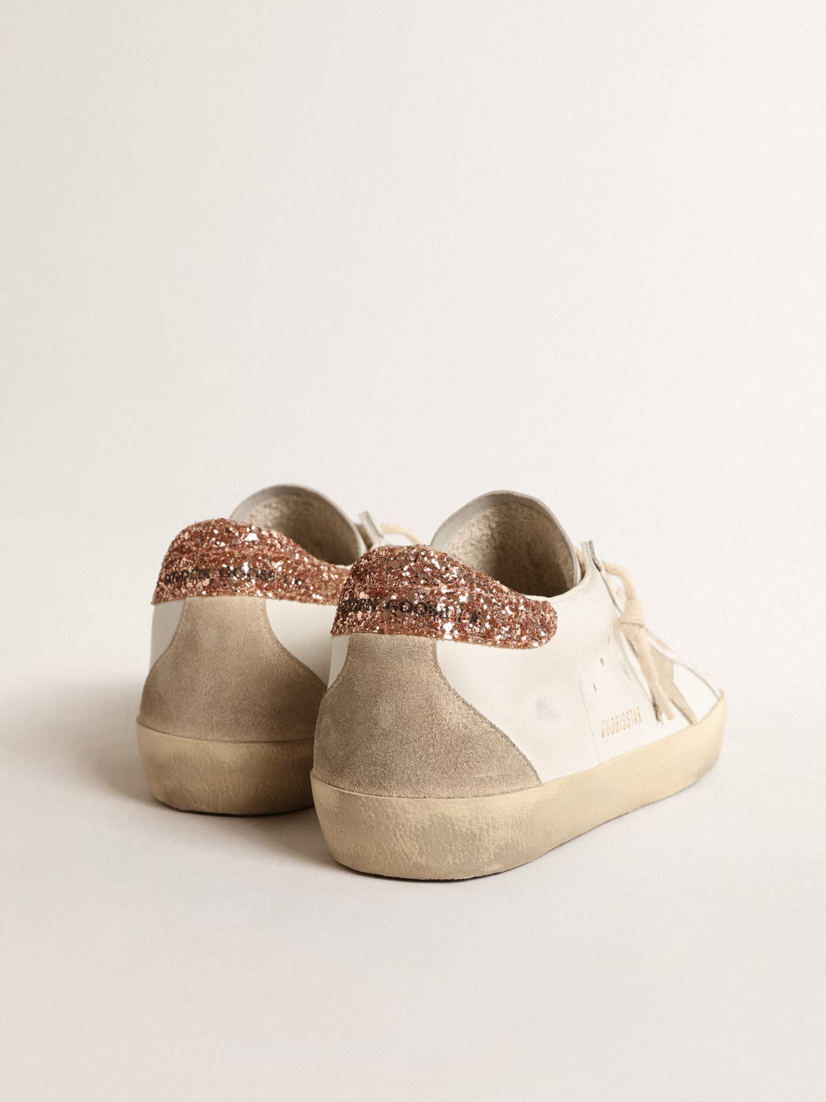Women's Super-Star with a suede star and peach-pink glitter heel tab