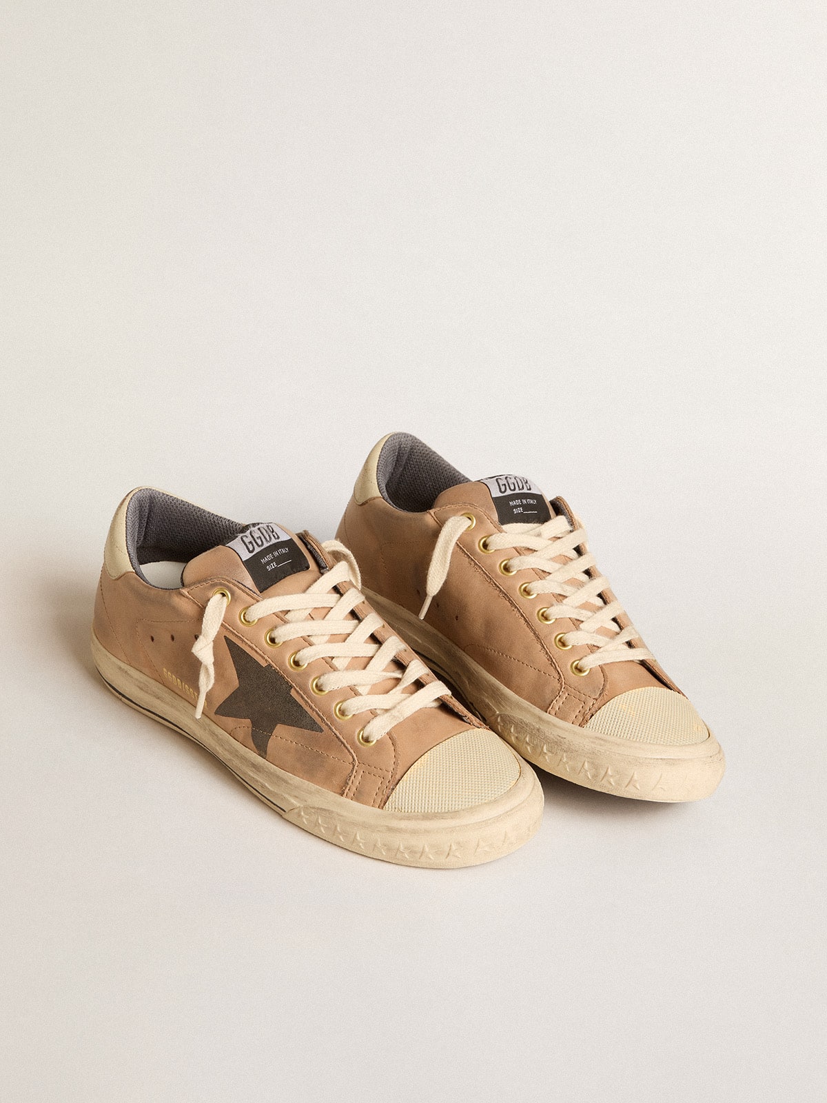 Super-Star in beige nubuck with black printed star and leather heel tab