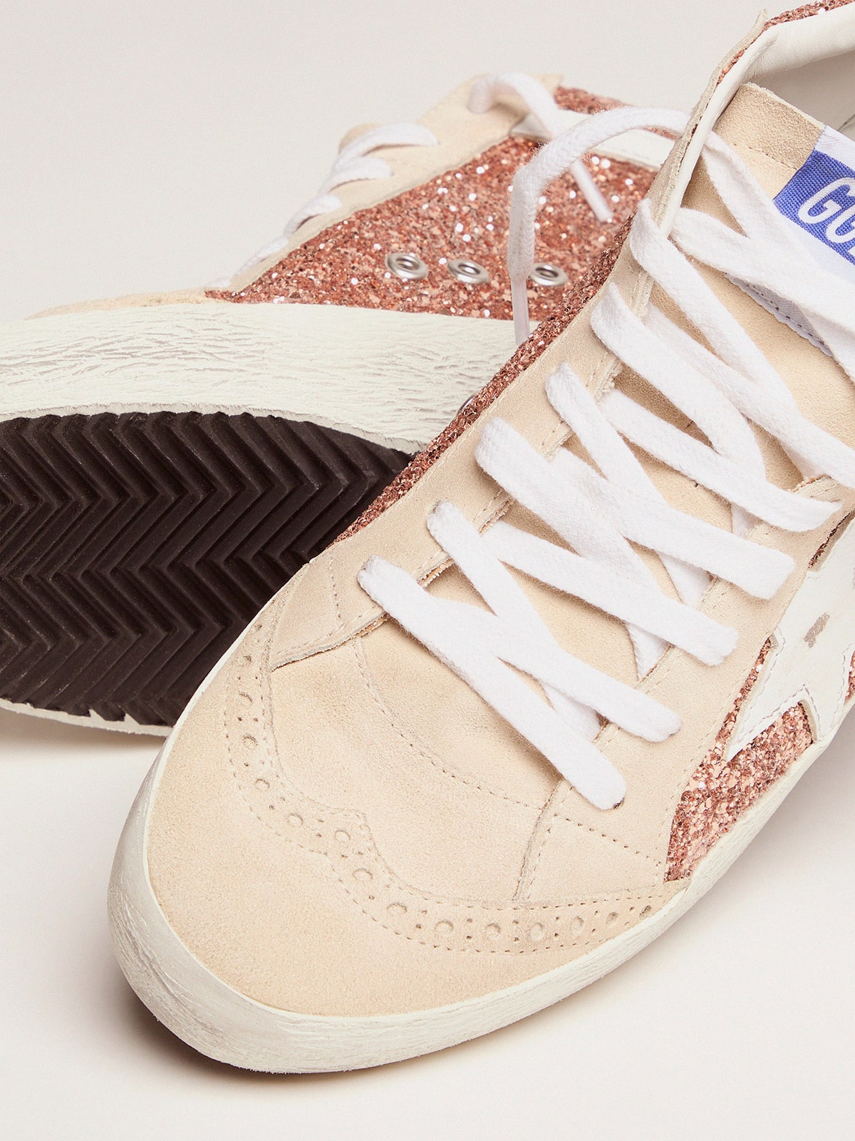 Mid Star para mujer con brillo rosa