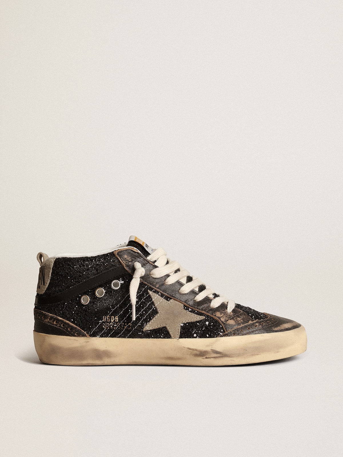 Mid Star para mujer en brillo negro con estrella y refuerzo en el talón de ante gris tórtola