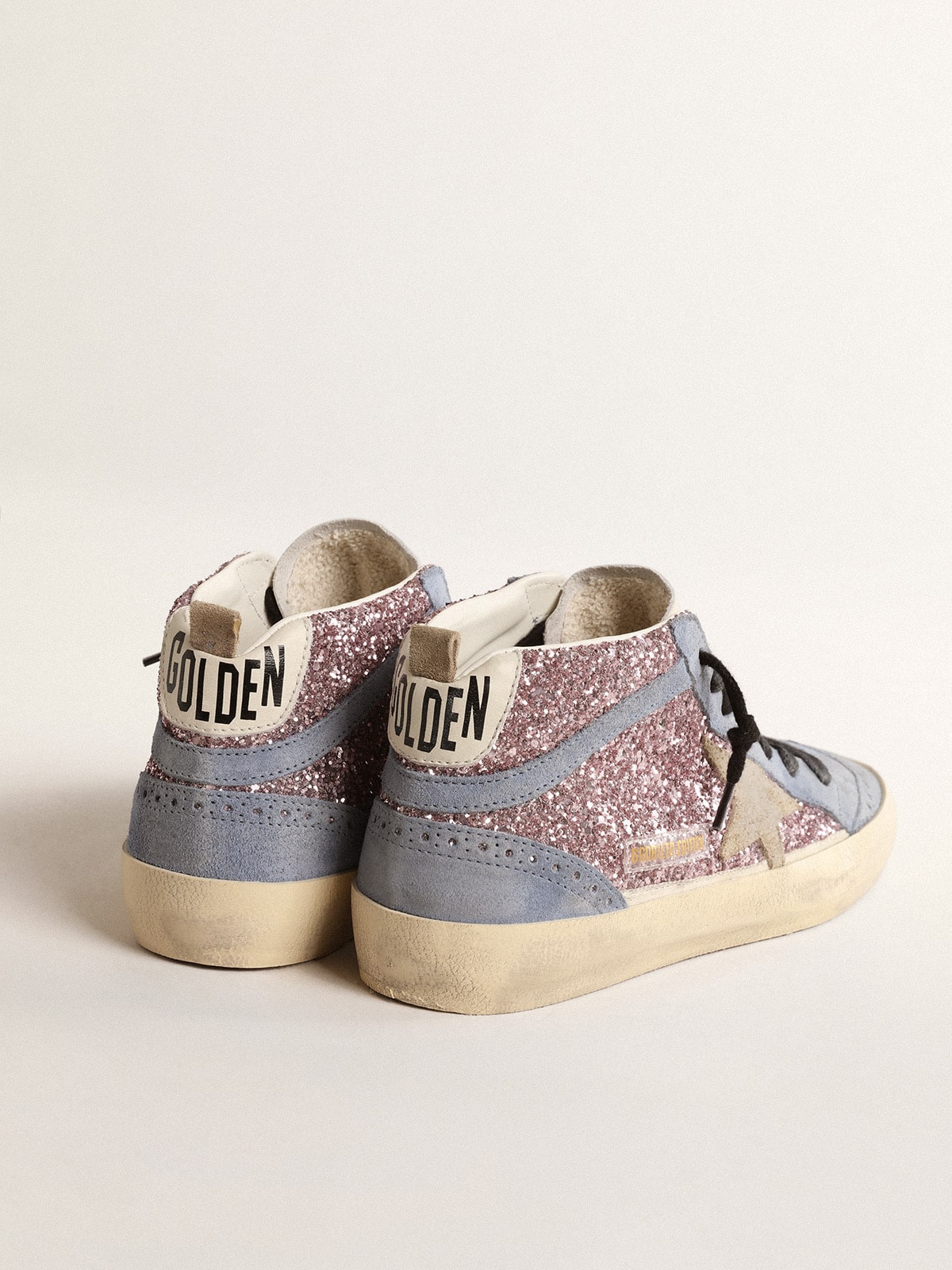 Mid Star LTD en purpurina lila con inserciones de ante azul claro